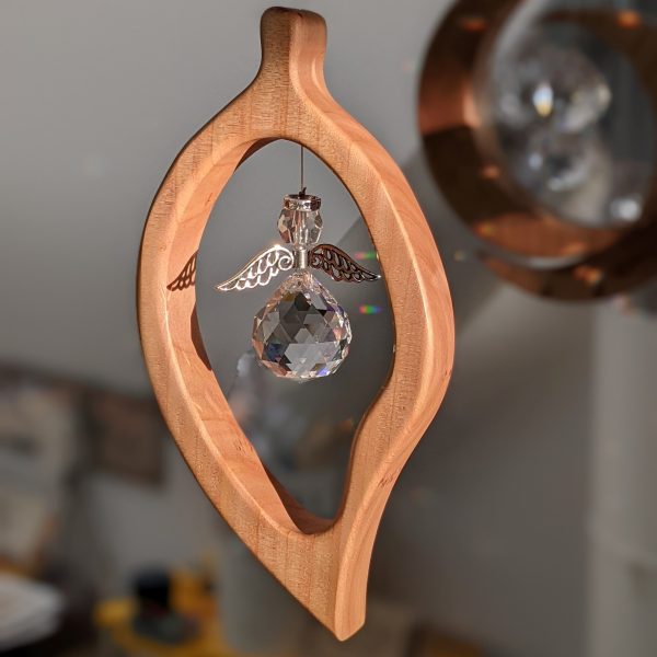 Leaf suncatcher with angel crystal in Cypress wood.